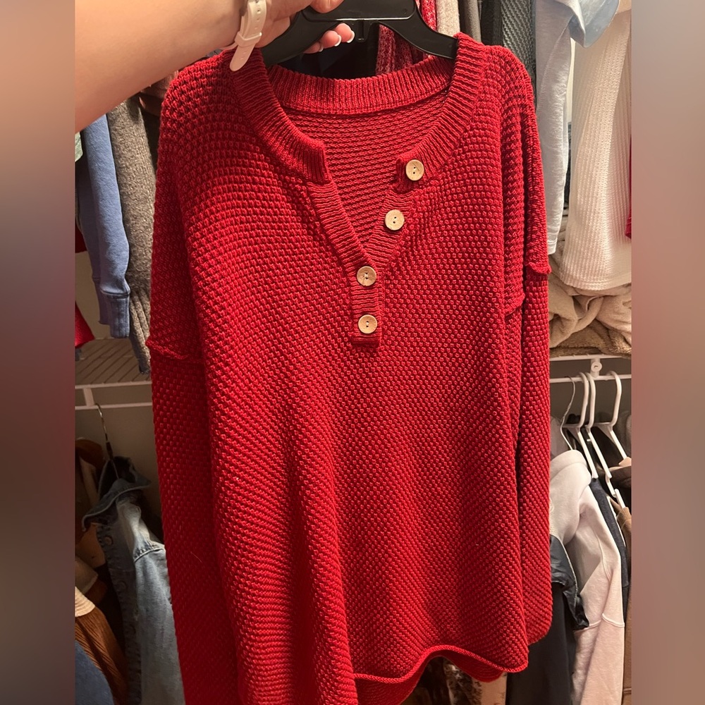 Loose, long, red sweater